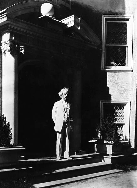 SAMUEL LANGHORNE CLEMENS (1835-1910). Mark Twain. American writer and humorist. Photographed, c1900