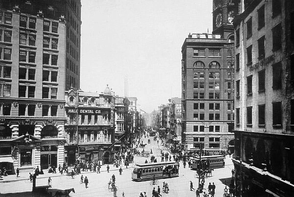 SAN FRANCISCO, c1900. Newspaper Row at Kearny and Market Streets, San Francisco; at far right stands the Hearst Building, second right the Chronicle Building. Photographed c1900