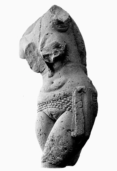 Sandstone sculpture fragment of a Yakshini, a benevolent tree spirit in Sanskrit mythology, who looks after treasure hidden in the earth. From Sanchi, India, 1st century B. C