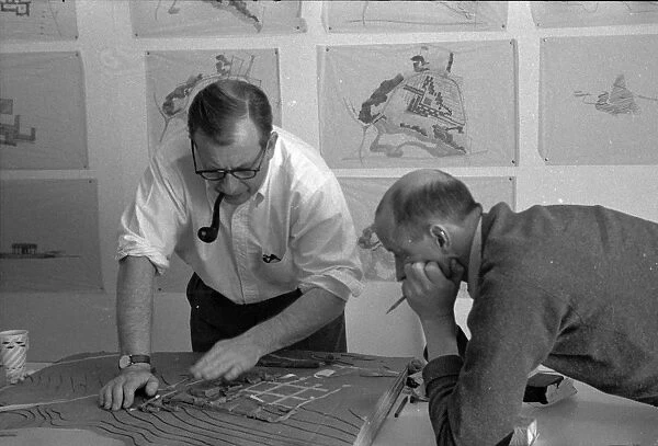 SaRINEN AND ROCHE, c1955. American architects Eero Saarinen and Kevin Roche at