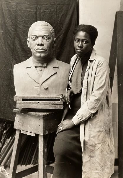 SELMA BURKE (1900-1995). American sculptor. Photographed with her bust of Booker T
