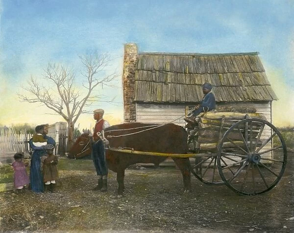 SHARECROPPERS, c1890. A sharecropper family in Virginia. Oil over a photograph