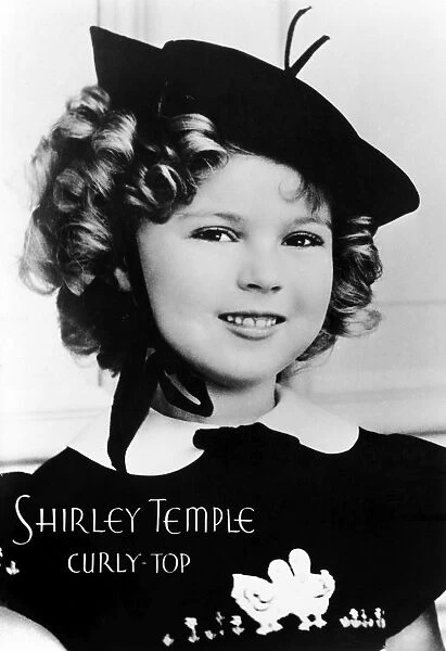 SHIRLEY TEMPLE (1928- ). American child star and politician. Publicity photograph for the 1935 film, Curly Top