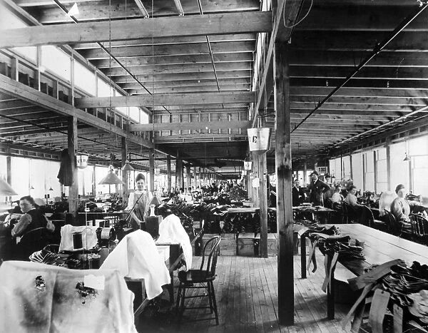 SHOE FACTORY, c1910. Woman workers at a shoe factory in New England