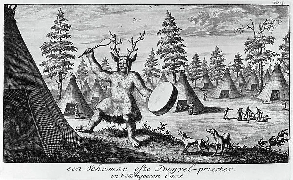 SIBERIA: SHAMAN. A shaman of the Tungus people of Siberia, with antlers and ritual drum. Copper engraving, Dutch, 1705, after a drawing by Nicolaes Witsen