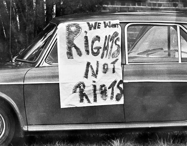 Sign on a car in Cape Town during riots that followed the Soweto uprising against the apartheid system, 1976