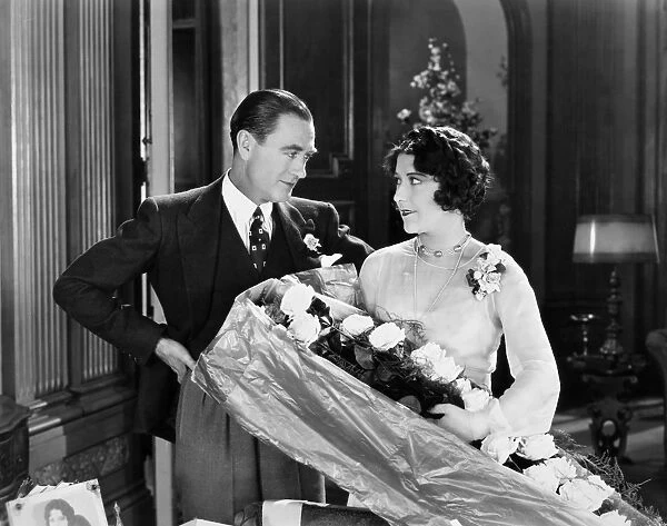 SILENT FILM STILL: COUPLES. Owen Moore and Aileen Pringle in a scene from Tea for Three