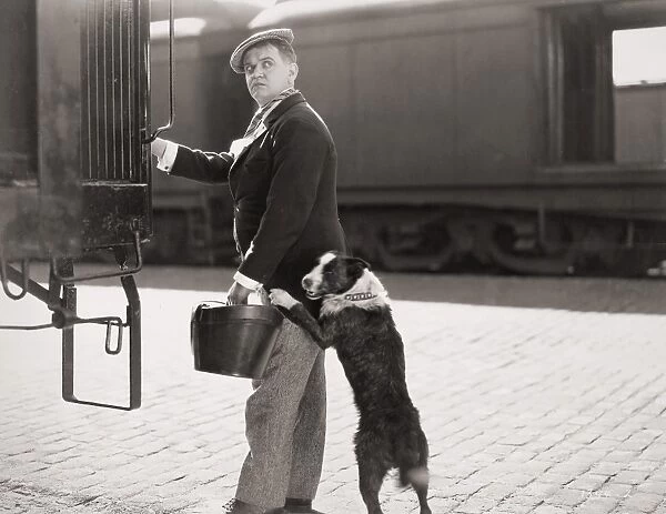 SILENT FILM STILL: TRAINS. Lloyd Hamilton in a scene from a silent film