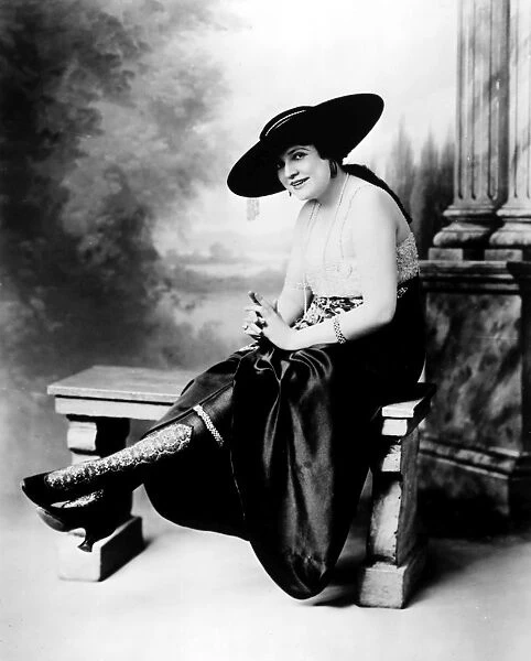 SILK STOCKINGS, c1920. American woman wearing silk stockings with high lace inserts