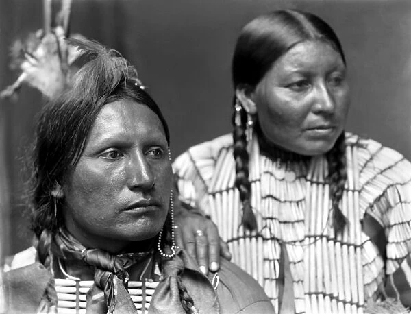 SIOUX COUPLE, c1900. Samuel American Horse, an Oglala Sioux Native American, and his wife. Photographed by Gertrude Kasebier, c1900