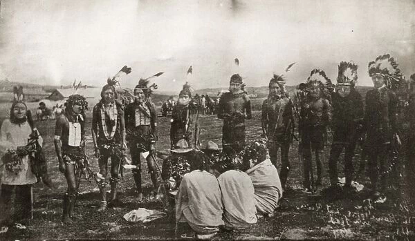 SIOUX DANCERS, 1891. A group of Brule Sioux dancers in ceremonial dress on the
