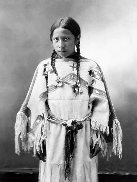 SIOUX GIRL, c1900. Julia American Horse, an Oglala Sioux Native American girl. Photographed by John Alvin Anderson, c1900