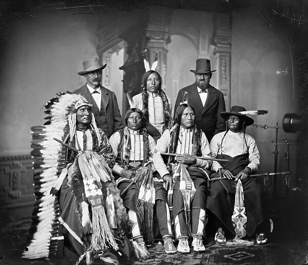 SIOUX MEN, c1875. Group of Sioux men. Back row, left to right: Joe Merrivale, Young Spotted Tail