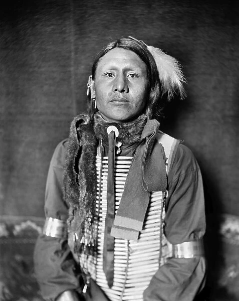 SIOUX NATIVE AMERICAN, c1900. Has No Horses, a Sioux Native American from Buffalo Bills Wild West Show, wearing a breastplate. Photograph by Gertrude Kasebier, c1900