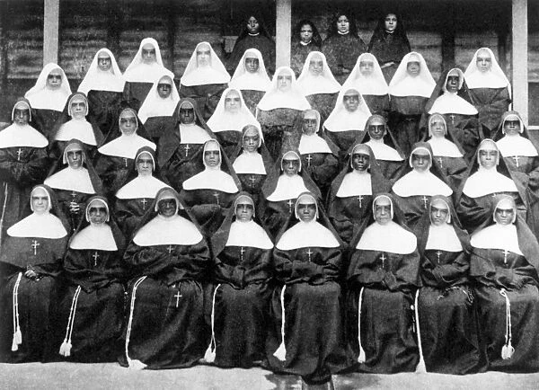 SISTERS OF THE HOLY FAMILY. A late 19th century photograph of the Sisters of the Holy Family
