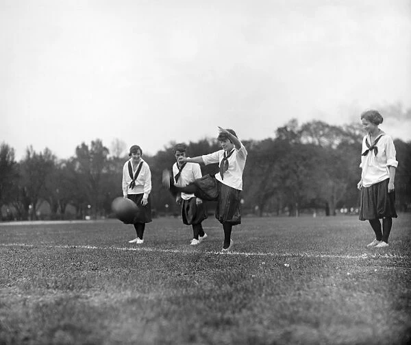 SOCCER, c1920. Young women playing soccer. Photograph, c1920