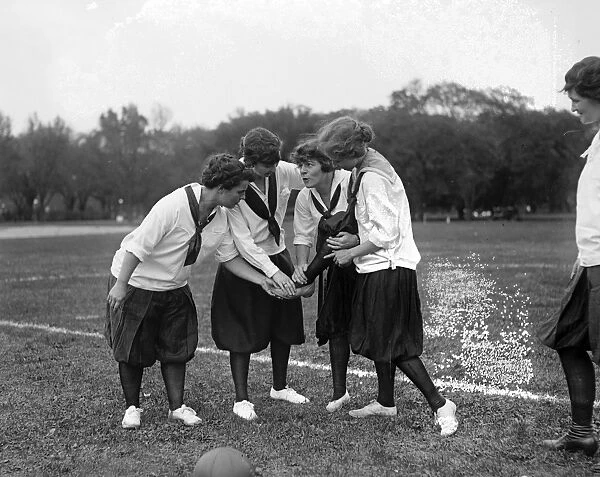 SOCCER, c1920. Young women on a soccer field. Photograph, c1920