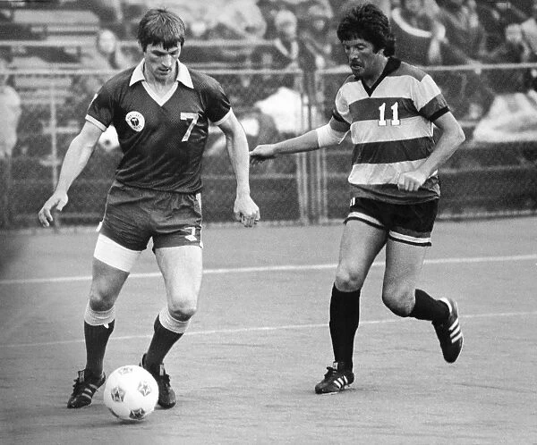 SOCCER MATCH, 1977. Stewart Scullion (left), playing for the Portland Timbers against Gordon Fearney of the Fort Lauderdale Strikers, 1977