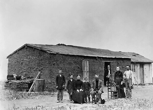 SOD HOUSE, c1880. A homesteader family in front of their sod house. Photograph, c1880