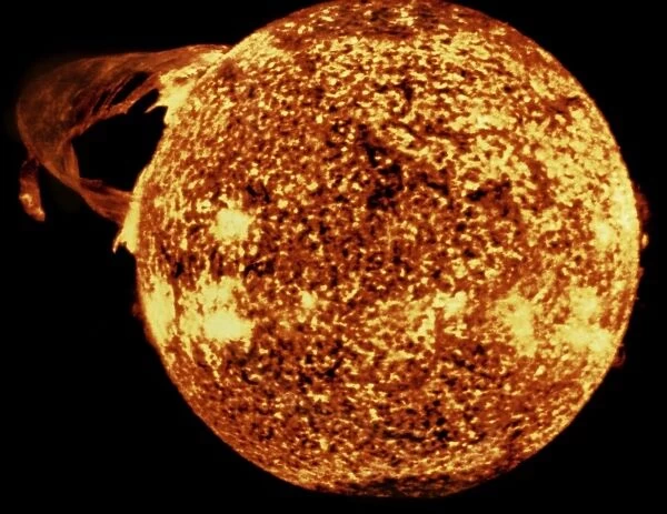 SOLAR FLARE, 1973. Image of the sun recorded by the SO82A spectroheliograph during the third and final manned Skylab mission (Skylab 4), 19 December 1973, showing a spectacular solar flare extending more than 365, 000 miles across the suns surface (top left)