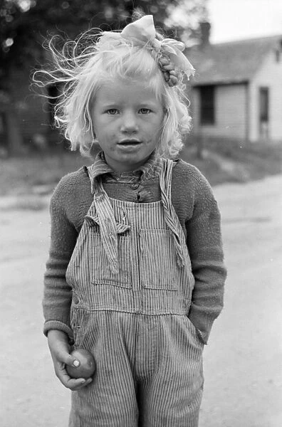 SOUTH DAKOTA: GIRL, 1939. A young girl in Sisseton, South Dakota. Photograph by John Vachon