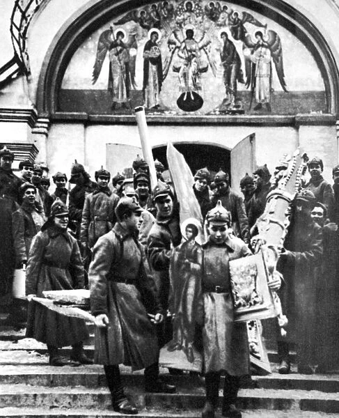 SOVIET ANTI-RELIGION POLICY. Red Army soldiers looting a convent, c1920