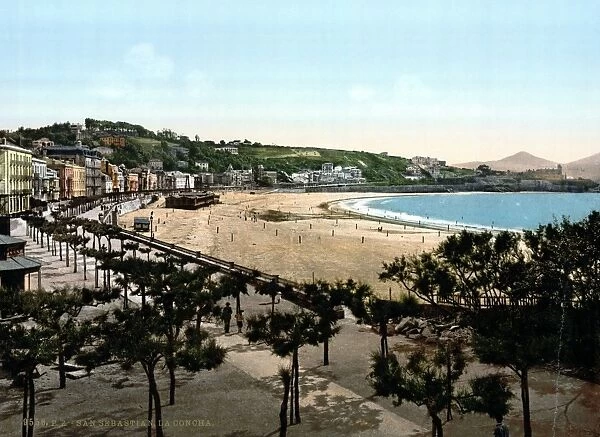 SPAIN: SAN SEBASTIAN. A view of the beach and a row of waterfront houses in San Sebastian, Spain. Photograph, late 19th century