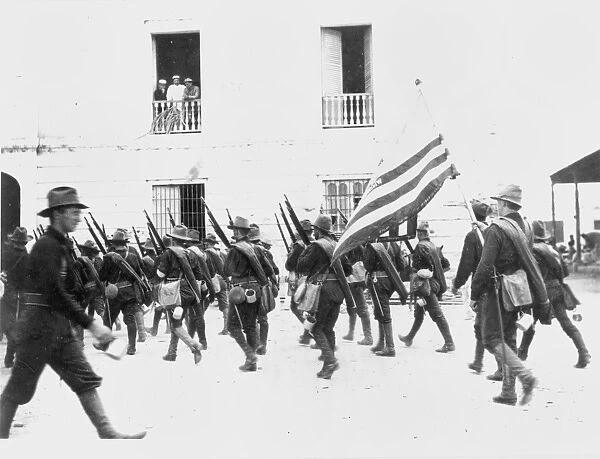 SPANISH-AMERICAN WAR, 1898. Wisconsin troops passing the Customs House in Ponce