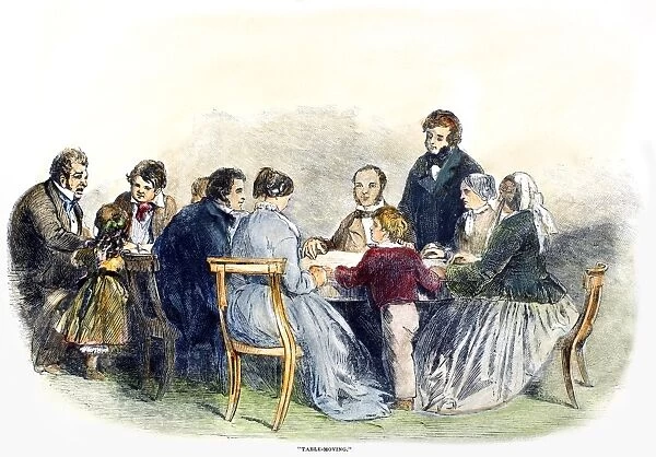 SPIRITUALISM: SEANCE, 1853. Table moving at an English seance in 1853. Contemporary wood engraving