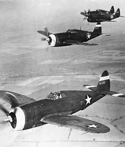 A squadron of Republic P-47 Thunderbolts, a U. S. Air Force single-seat fighter plane. Photographed 1943