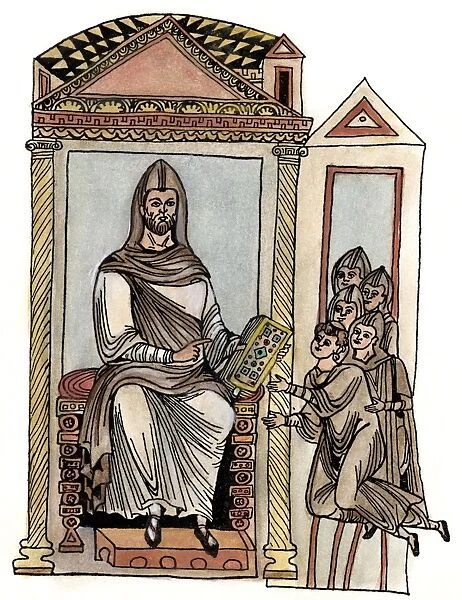 ST. BENEDICT (c480-c543). Italian religious. Saint Benedict of Nursia handing the Rule