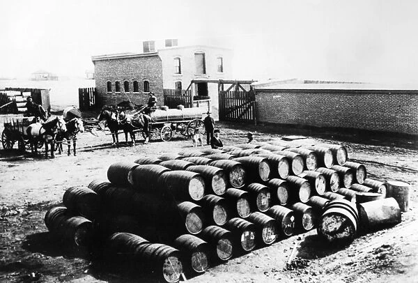 A stack of barrels at the warehouse of Continental Oil, Butte, Montana, 1880
