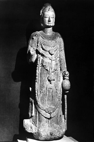 Standing stone figure of a bodhisattva, with traces of polychrome. Height: 47 in. Sui Dynasty, 589-618 A. D