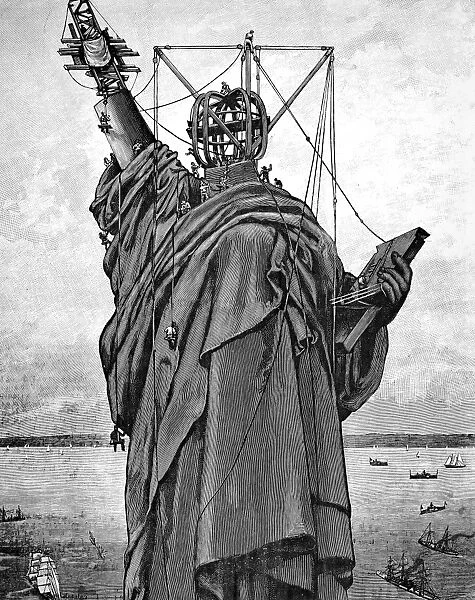 STATUE OF LIBERTY, 1886. Completing the assembly of the statue in New York Harbor. Wood engraving, 1886