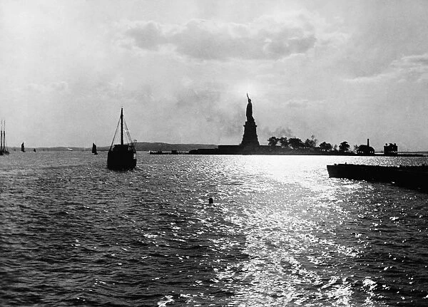 STATUE OF LIBERTY, 1891. The Statue of Liberty on Bedloe Island in New York Harbor, 1891. Staten Island can be seen in the background