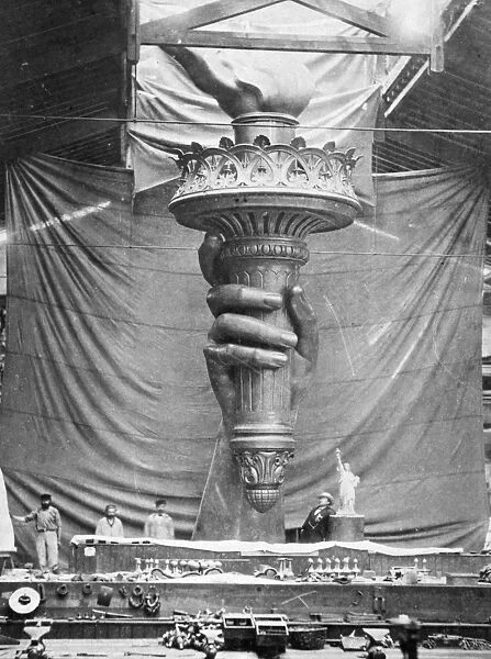 STATUE OF LIBERTY, PARIS. The torch of the statue at the Monduit and Bechet workshop in Paris, France, c1883