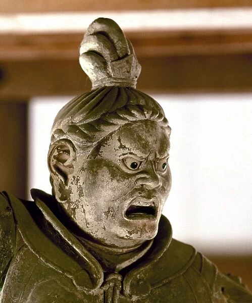 Statue of a warrior demigod, his face indicating wrath, one of the deva gods who guards Buddhist temples. Clay and painted lacquer, Japanese, 8th century A. D