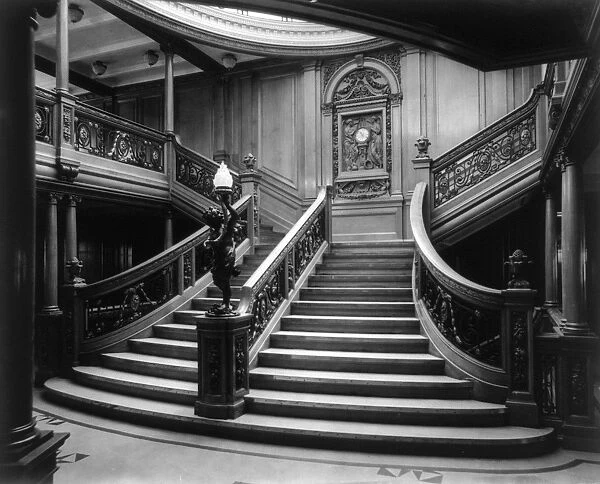 STEAMSHIP: STAIRCASE, c1911. The interior of the Grand Stairway, second landing