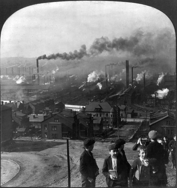 STEEL MILLS, c1907. Children playing near the steel mills at Homestead, Pennsylvania