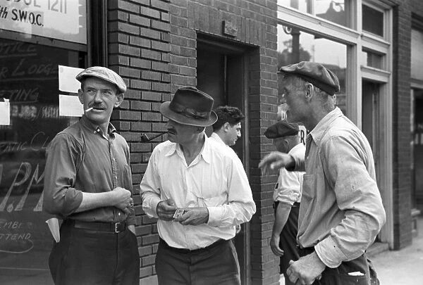 STEELWORKERS, 1938. Steelworkers taking a smoking break in Aliquippa, Pennsylvania