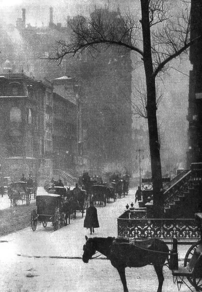 STIEGLITZ: NEW YORK, 1903. Horses and carriages on a snowy street in New York City. Photograph by Alfred Stieglitz, 1903