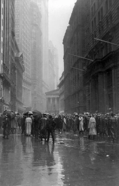 STOCK BROKERS, c1922. Crowd of men involved in curb exchange trading on Broad Street