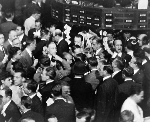 STOCK EXCHANGE, c1936. Stock brokers trading on the floor of the New York Stock Exchange
