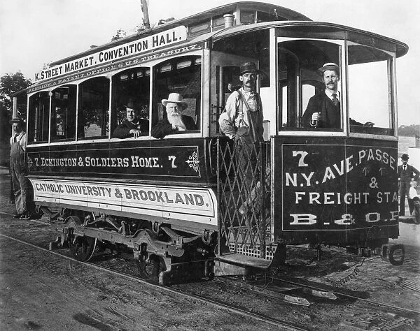 STREET CAR, c. 1895. An electric street car in Washington, D. C. employing a surface contact system using a skate to supply power at the front of the car