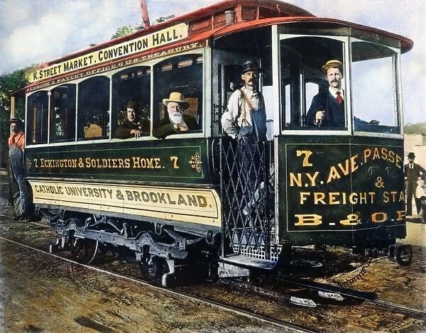 STREET CAR, c. 1895. An electric street car in Washington, D. C. employing a surface contact system using a skate to supply the power at the front of the car: oil over a photograph, c. 1895