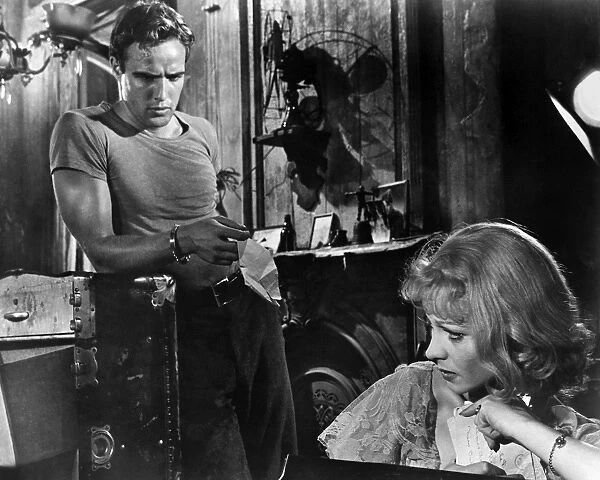 A STREETCAR NAMED DESIRE. Marlon Brando as Stanley Kowalski and Vivien Leigh as his sister-in-law Blanche DuBois in the film adaptation of Tennessee Williams play, directed by Elia Kazan, 1951