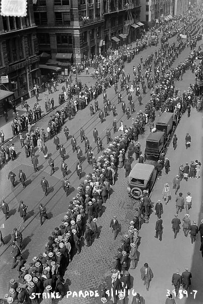STREETCAR STRIKE, 1916. Striking streetcar workers marching in a parade in New York City