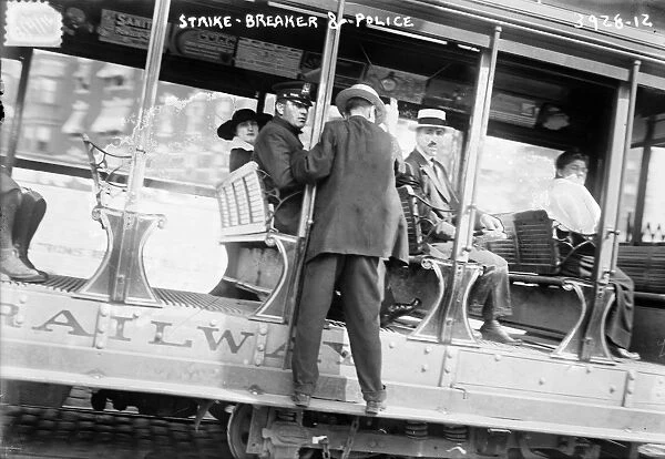 STRIKEBREAKERS, c1916. Strikebreakers and police during a streetcar strike, possibly