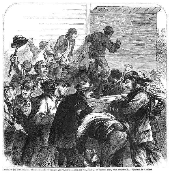 STRIKING COAL MINERS, 1871. Striking coal miners writing threats to blackleg