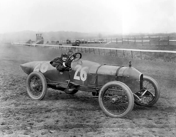 STUTZ RACECAR, 1916. A man and woman in a Stutz Weightman Special racecar at the